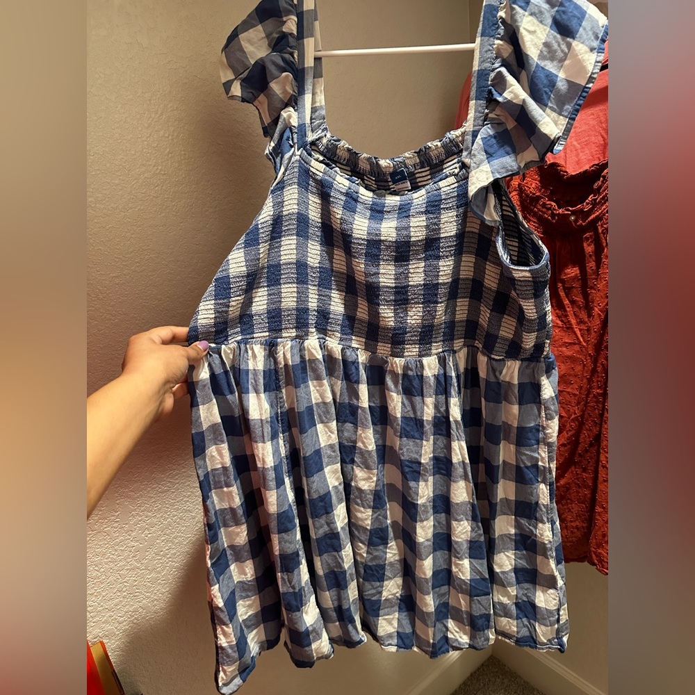 Blue and white mini dress. Ruffle shoulders can be worn on shoulders or off